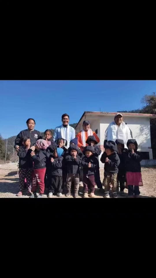 Wings Nepal Foundation team with children at Golchi village